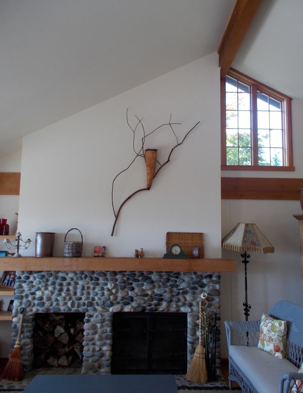Wall sculpture and fireplace