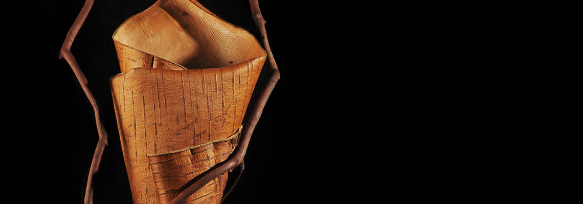 Detail of sculpture made from shaped wild cherry bark sewn to Madrona branch